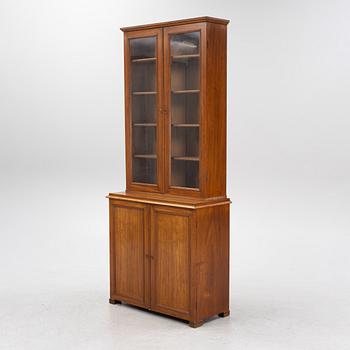 A mahogany veneered cabinet, late 19th Century.