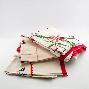 A collection of Christmas tablecloths, 13 pcs in larger sizes, 20th century.