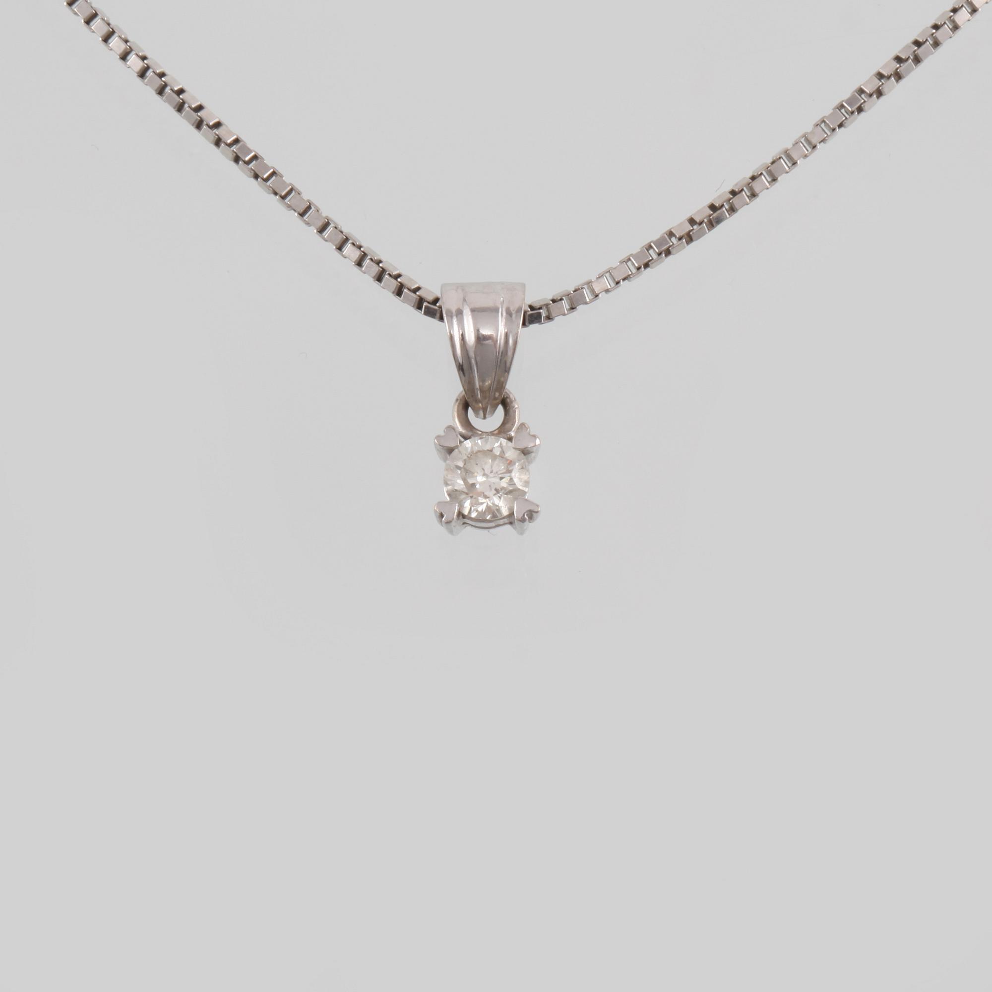 HÄNGE, 18K vitguld med briljantslipad diamant ca 0.20 ct. Vikt 4,2 gram.