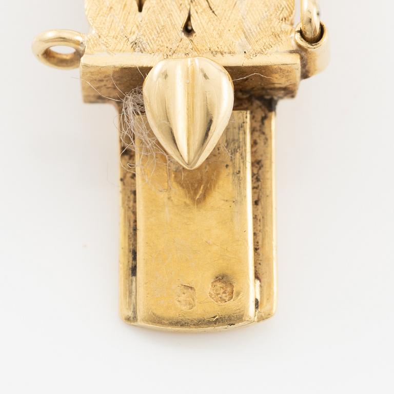 Armband 18K guld med rosa safirer och briljantslipade diamanter.