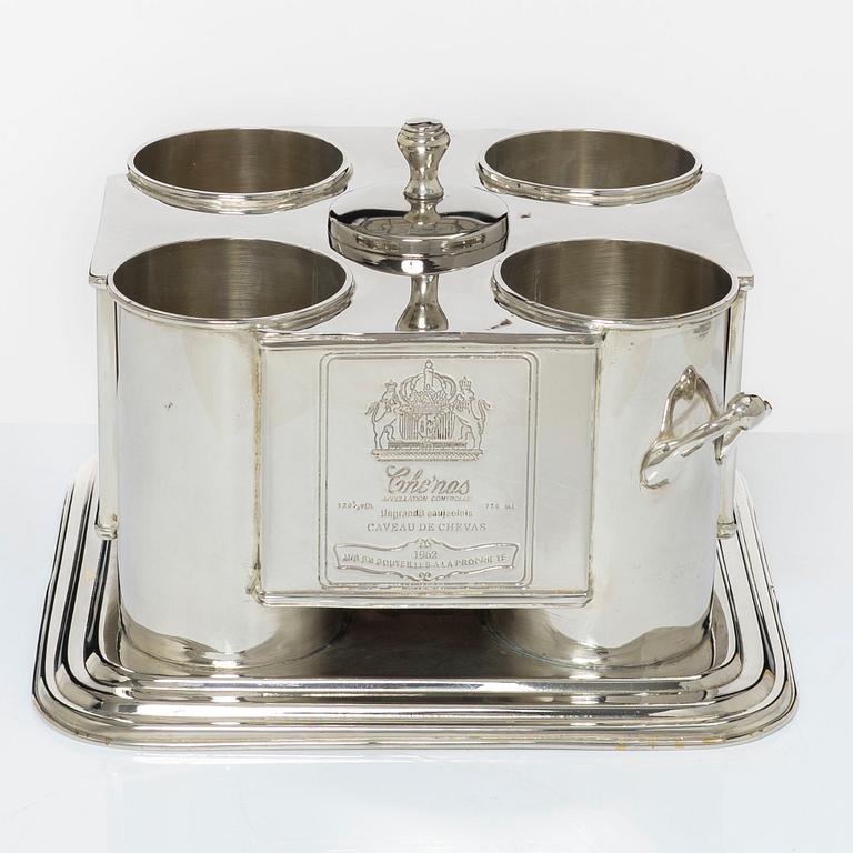 A silver plated four-bottle wine cooler.