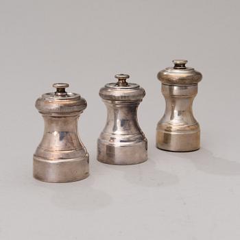 Three Peugeot pepper mills, silver and silver plate, France, latter half of the 20th century.