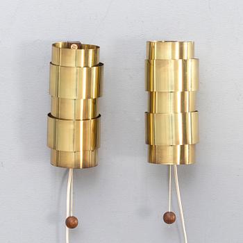 Wall lamps, a pair, brass, wood, probably Hans-Agne Jakobsson.