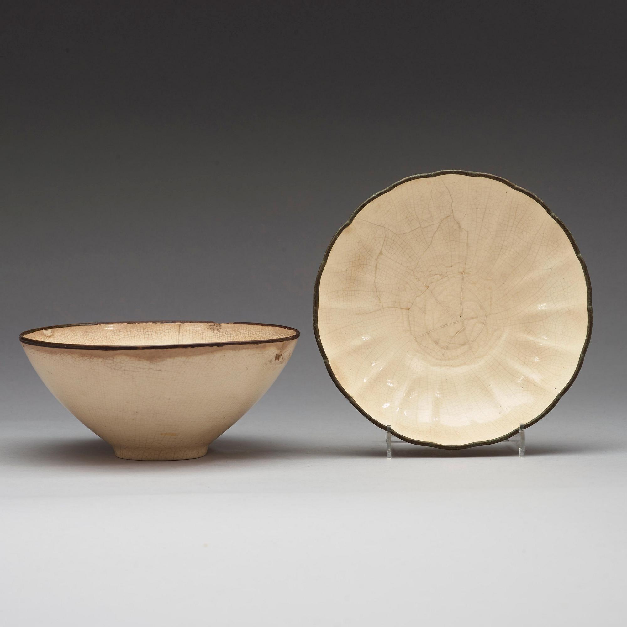 A creamglazed dish and a bowl, Ming dynasty (1368-1643).
