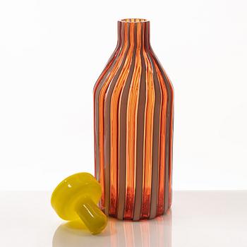 A glass bottle, possibly Fratelli Toso, Murano, Italy.