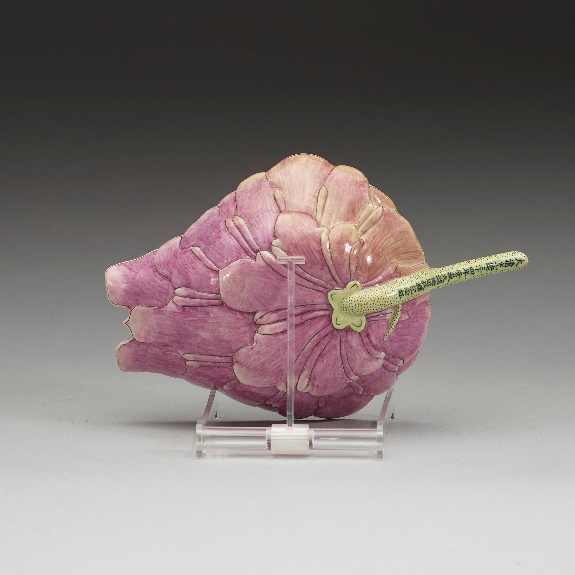 A famille rose water dropper in the shape of a lotusflower, dated to the 34 year of Guangxu, corresponding to 1908.