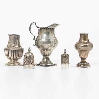 Two silver casters and cream jug, England.
