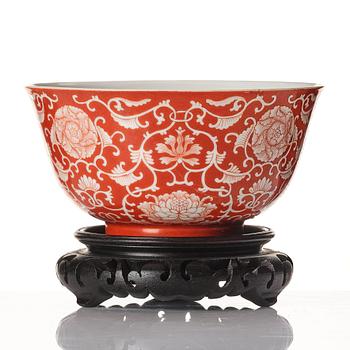 A coral red reverse decorated lotus bowl, Qing dynasty with Daoguang mark in underglaze blue.