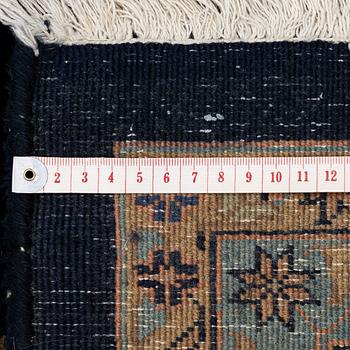 An India Carpet, c. 380 x 285 cm.