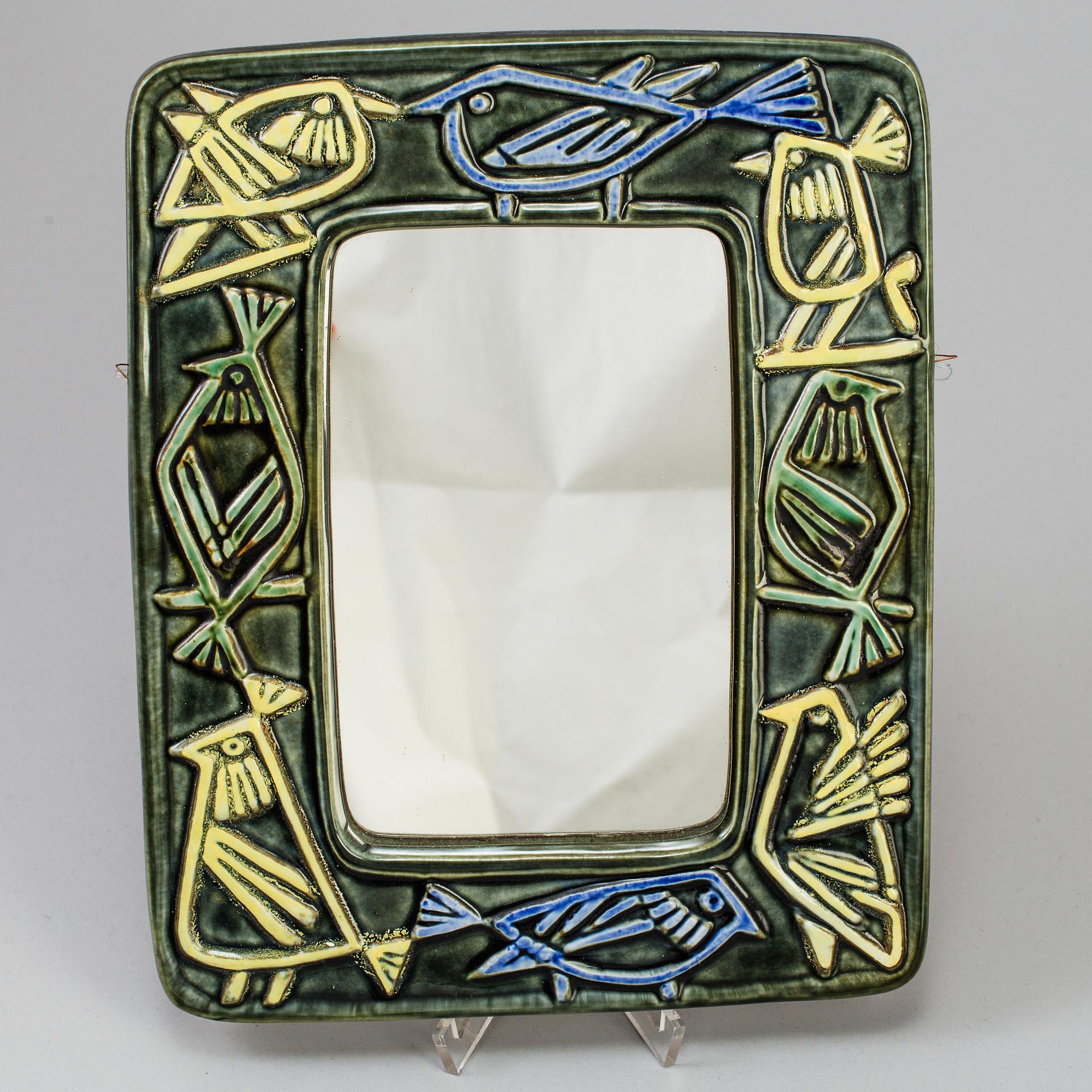A stoneware mirror by Lisa Larson, Gustavsberg.