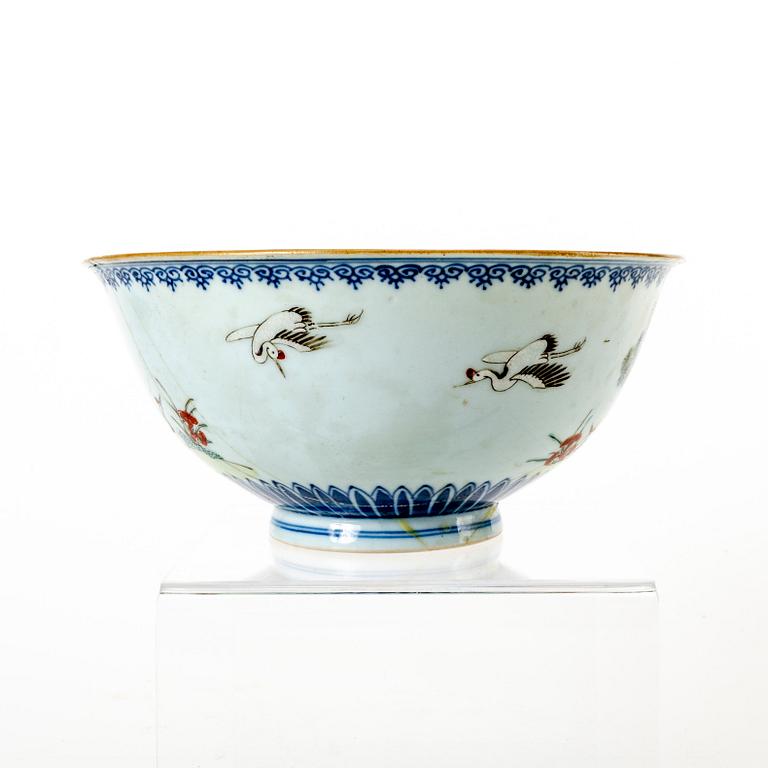 A famille rose bowl, late Qing dynasty, with Qianlong mark.