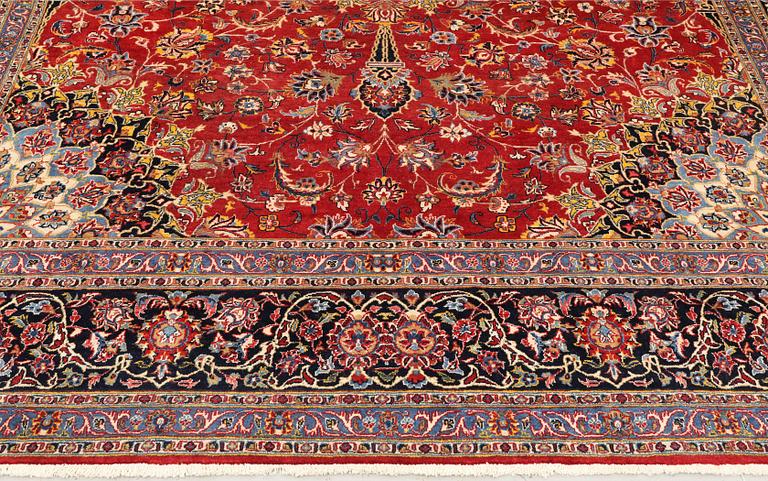 A Kashmar carpet, approx. 387 x 297 cm.