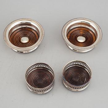 Coasters, two pairs, silver plate, England.