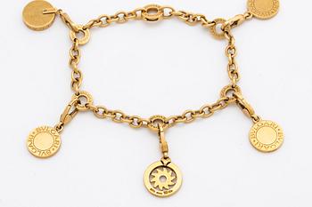 BVLGARI BRACELET w 5 charms (detachable), 18K gold and whitegold, onyx, mother-of-pearl, brilliant-cut diamonds 0,20 ct.