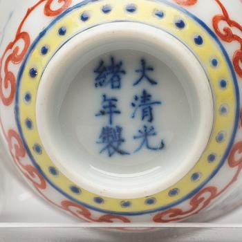 A pair of Chinese famille rose ba jixiang wine cups, Republic, with Guangxu six character mark.