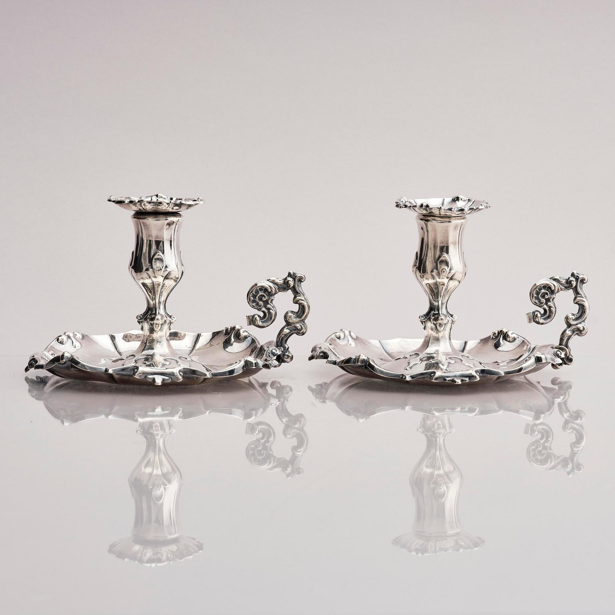 Gustaf Möllenborg, nattljusstakar, ett par, silver, Stockholm 1857.