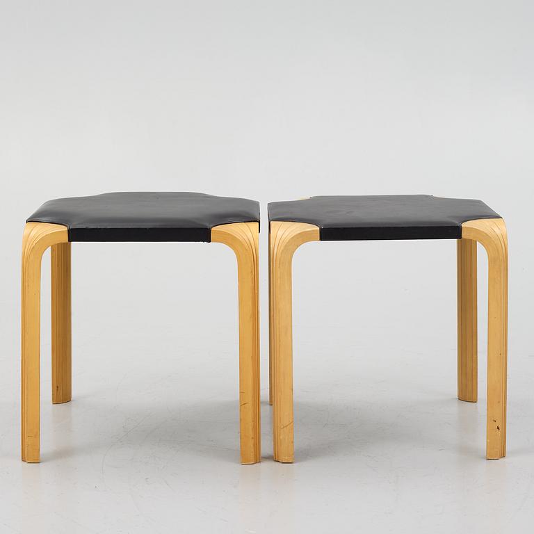 Alvar Aalto, a pair of 'X601' stool for Artek, later half of the 20th century.