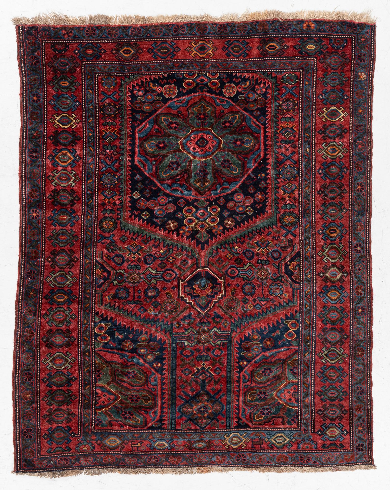 An antique Northwest Persian rug, c. 179 x 143 cm.