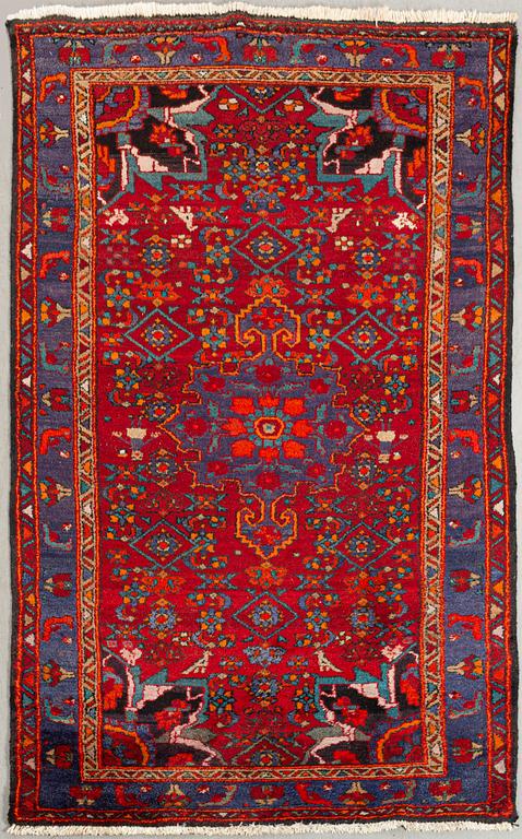 An old Nahavand carpet ca 215 x 130 cm.