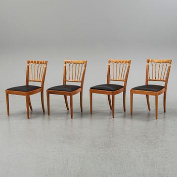 A set of four mahogany and rattan dining chairs, Josef Frank, , model 1165, Svenskt Tenn, Stockholm.