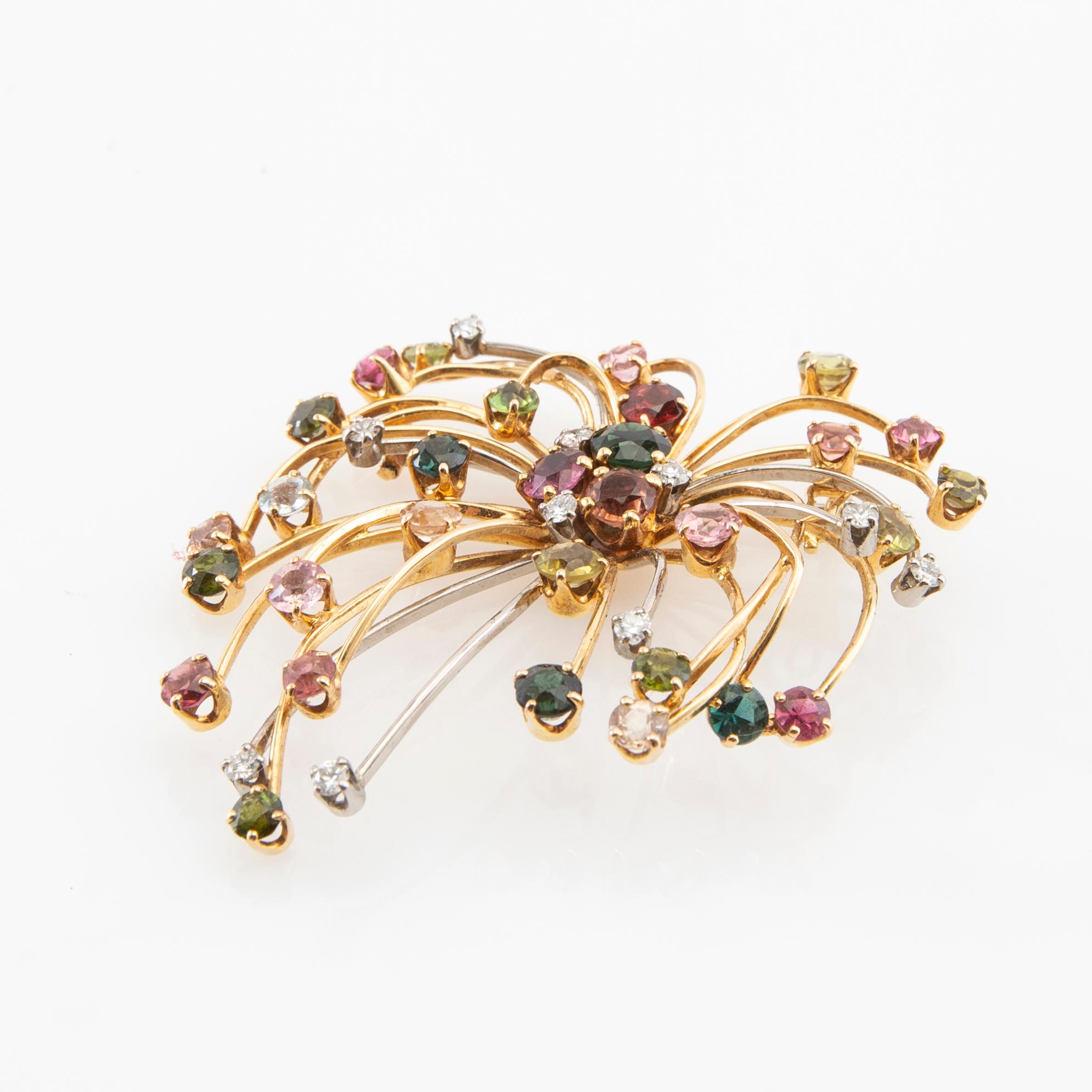 CF Carlman, Brooch 18K gold set with round brilliant-cut diamonds and faceted gemstones, Stockholm 1955.