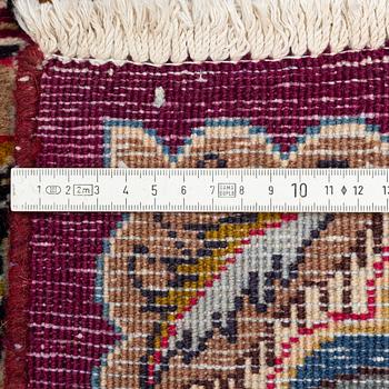 A Kashmar carpet, ca 295 x 202 cm.