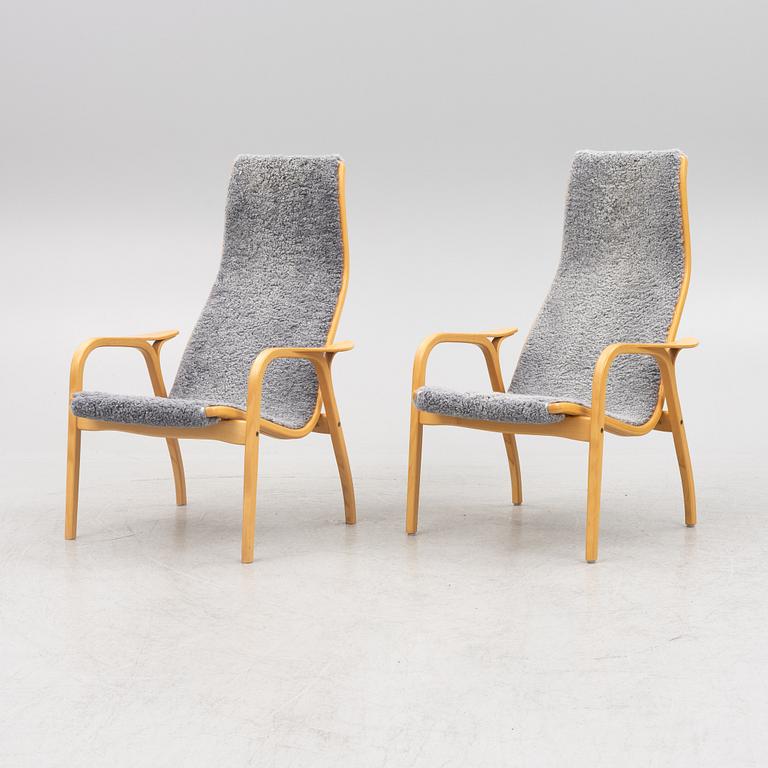 Yngve Ekström, a pair of "Lamino" armchairs for Swedese.