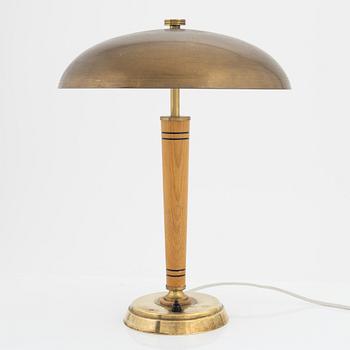 A Swedish Morden brass and elmwood table light, 1940's.