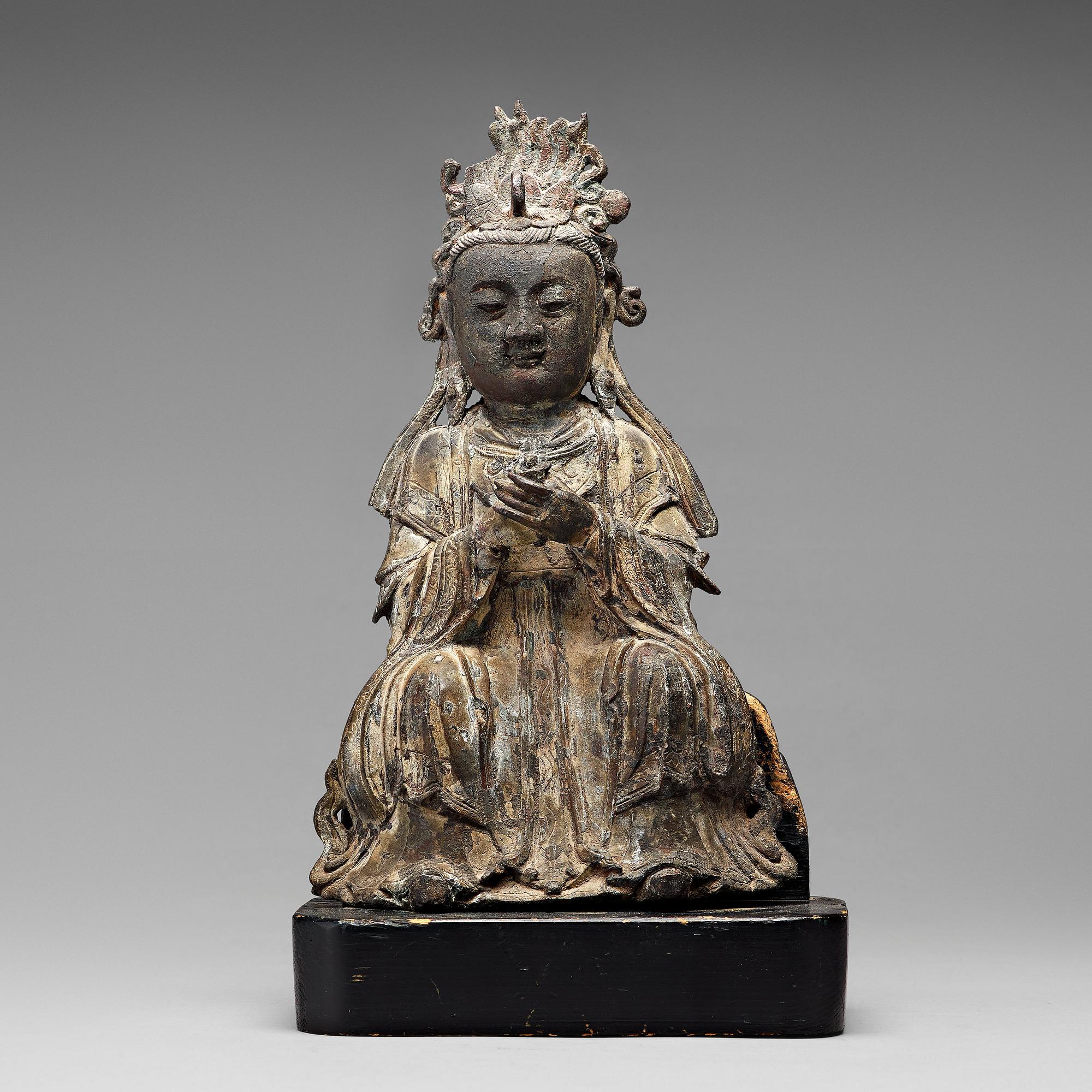 A bronze figure of Guanyin, Ming dynasty (1368-1644).