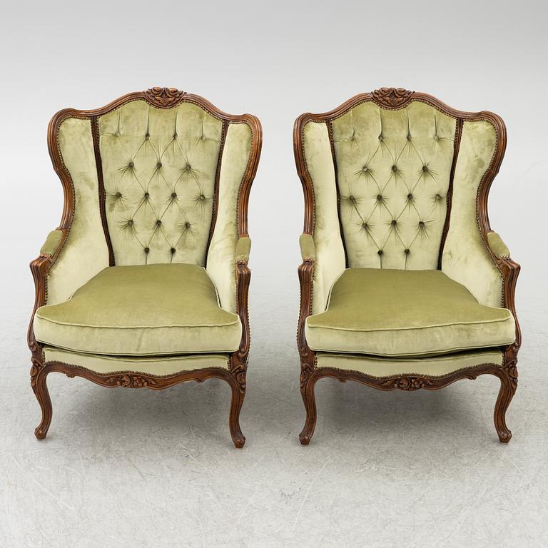A pair of bergère armchairs, rococo-style, first half of te 20th century.