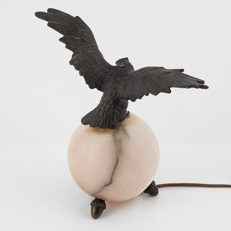 An onyx and bronze Empire style table lamp,  first half of the 20th century.