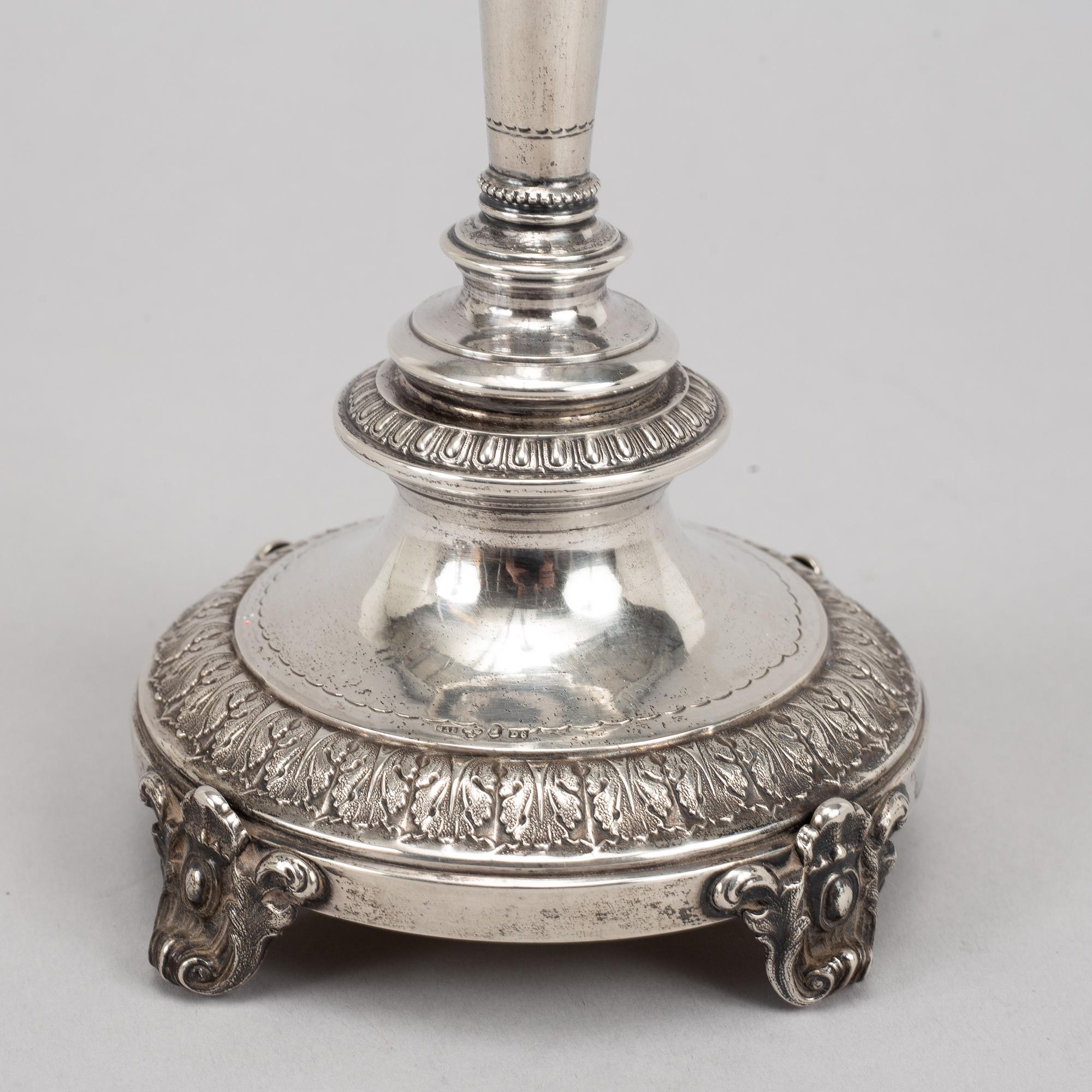 A pair of swedish silver candlesticks, mark of Guldsmedsaktiebolaget GAB, Stockholm 1882.