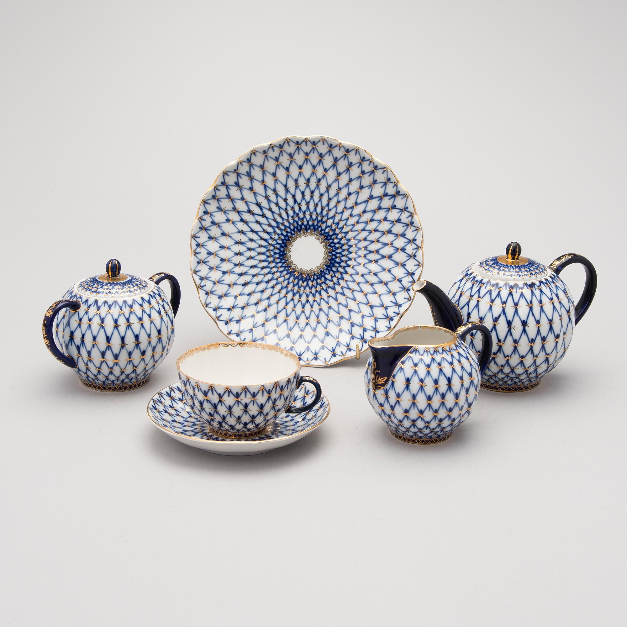 A 9-piece 'Cobalt net' porcelain tea set from Lomonosov, USSR.