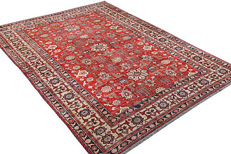 A Kazak carpet, c. 325 x 240 cm.