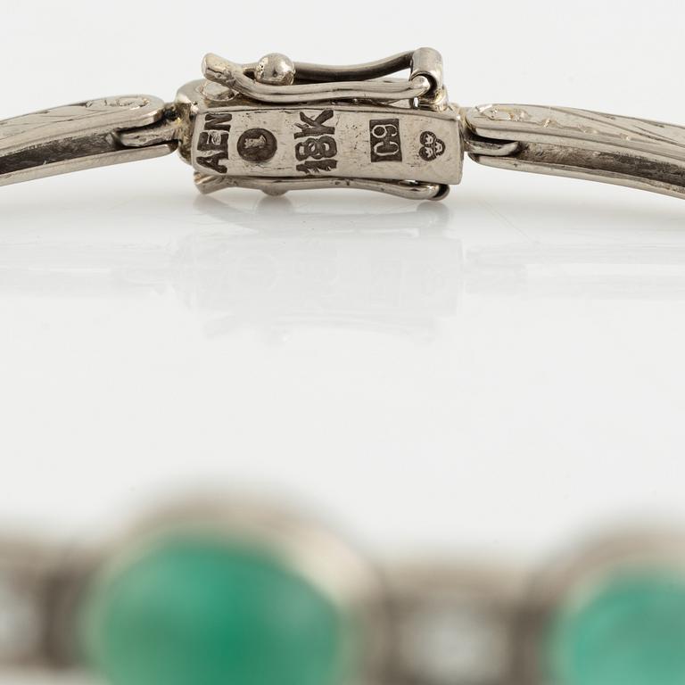 Cabochon cut emerald and brilliant cut diamond bracelet.