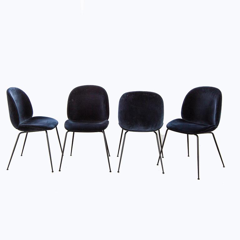 A set of four Beetle dining chairs by Gamfratesi for Gubi 2013.