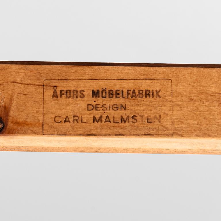 Carl Malmsten, Dining table with 2 armchairs and 6 chairs, 'Ambassador', Åfors Möbelfabrik, second half of the 20th century.