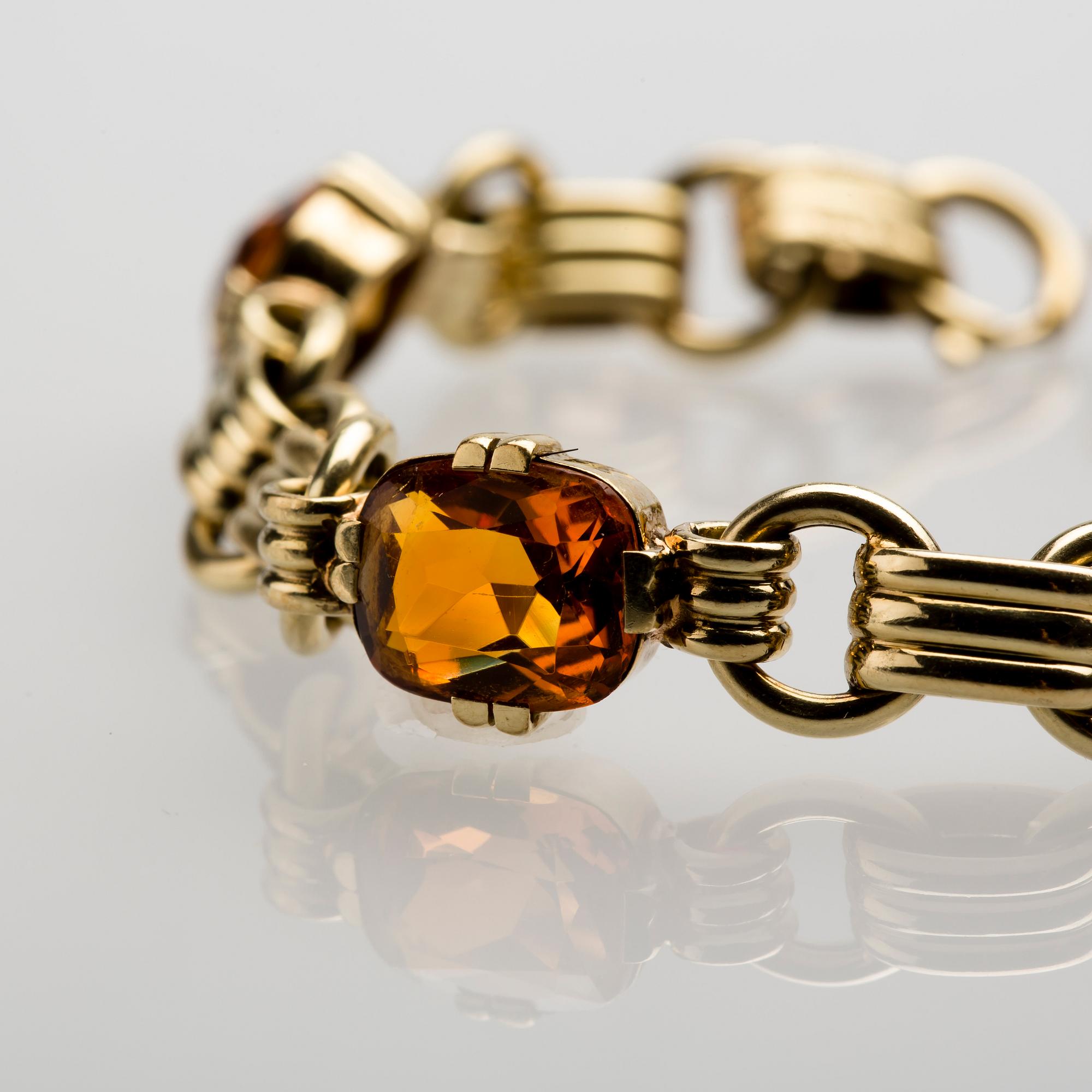 ARMBAND, 14 K guld med citriner, ca 9.00 ct. Vikt ca 16 g.