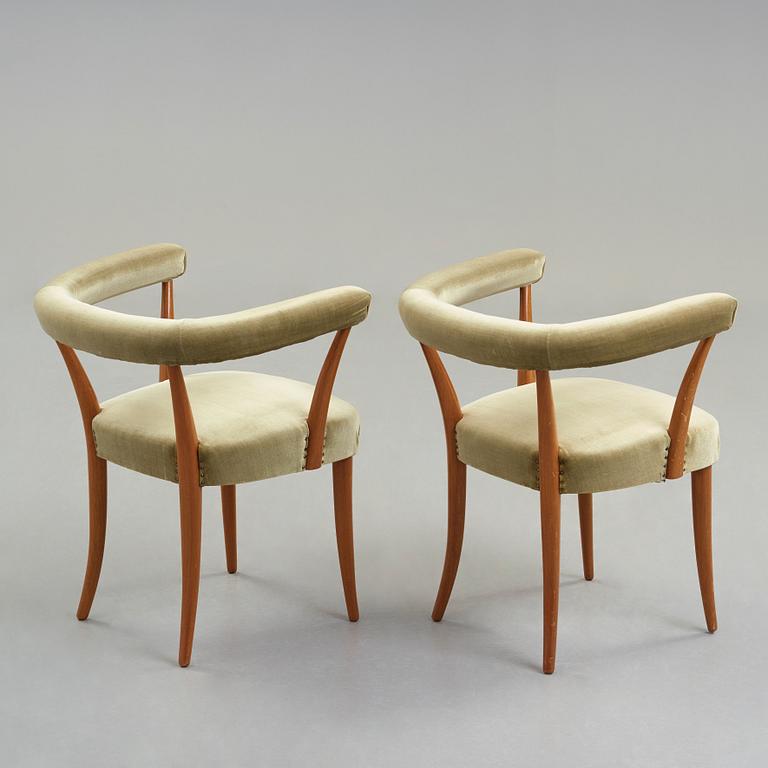 Josef Frank, a pair of mahogany horseshoe chairs, Svenskt Tenn, Sweden, mid 20th Century, model 966.