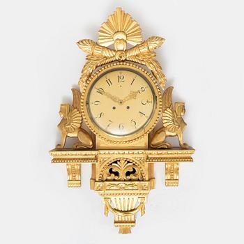 An Empire style wall clock, mid 20th century.