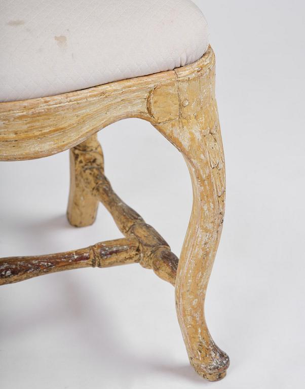 An assembled set of eight Swedish rococo chairs, Stockholm, later part 18th century.