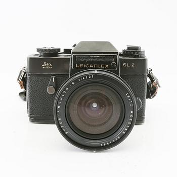 Leica camera with 4 lenses.