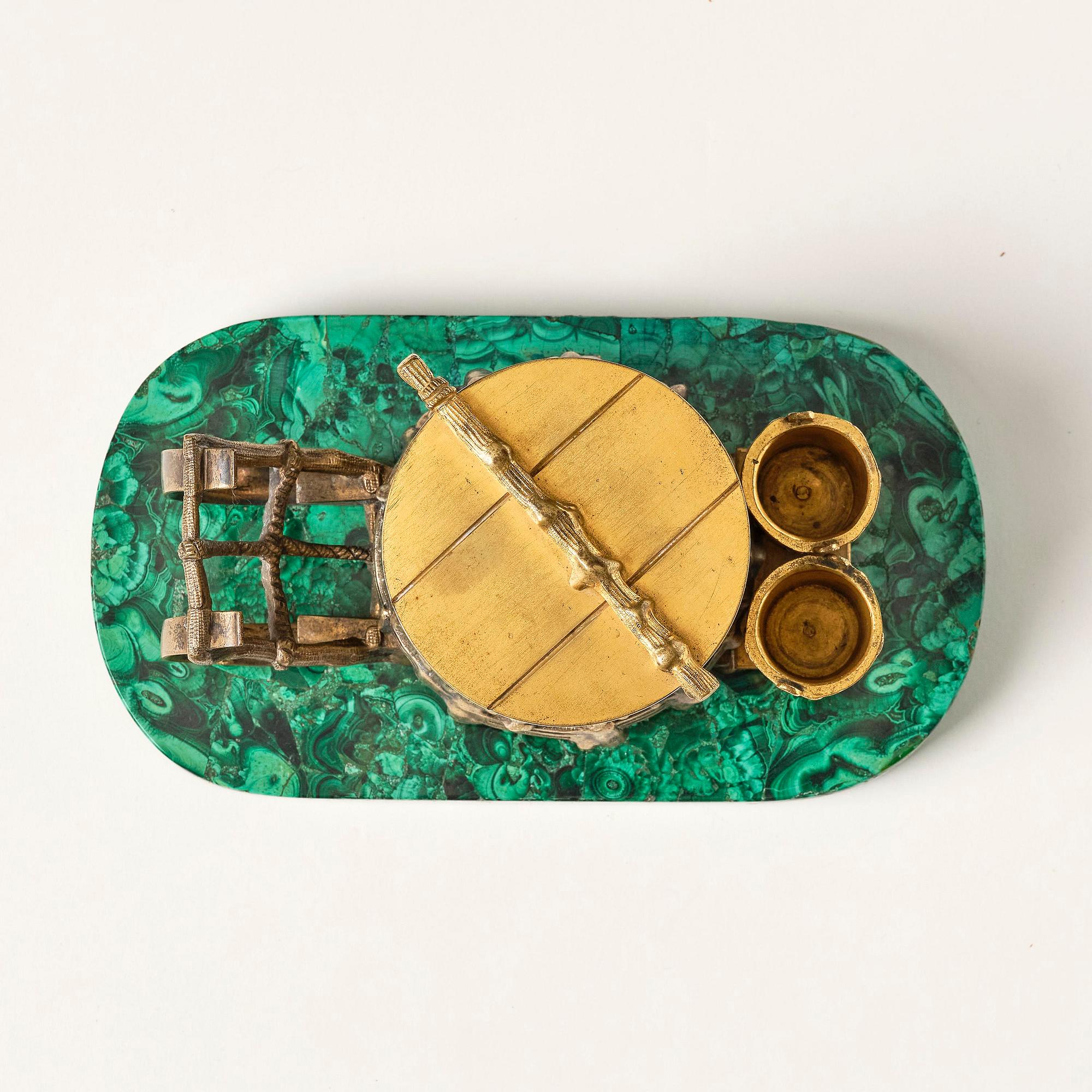 A Russian Alexander II malachite-veneered, silvered and gilt bronze inkwell, later part 19th century.