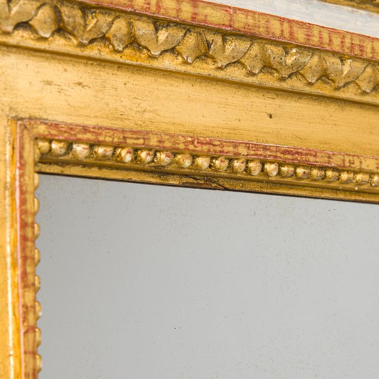 A mirror by Fredric Johan Foeder or Fjäder, (Master in Turku 1782-1832). Signed F.J.F and hallmarked in Turku.