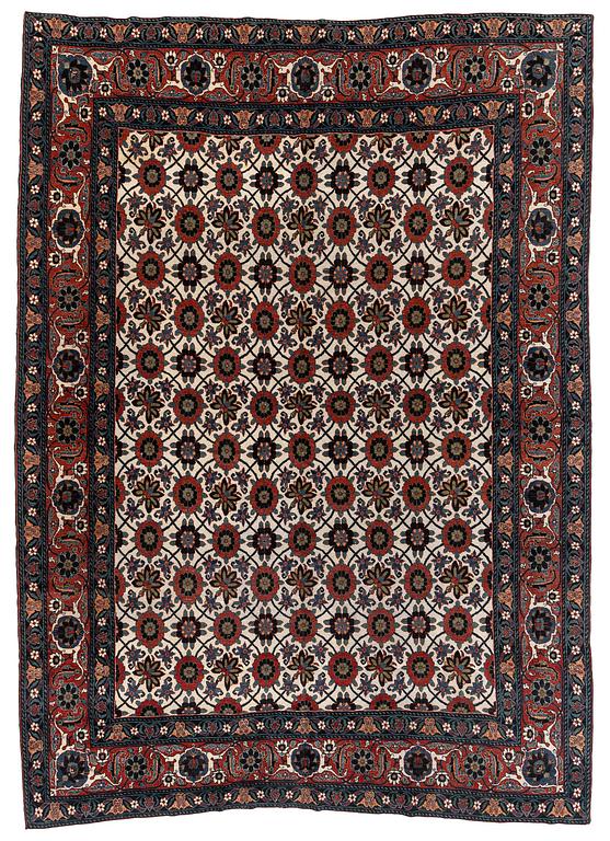 An antique Veramin carpet, West Persia, 380 x 271 cm.