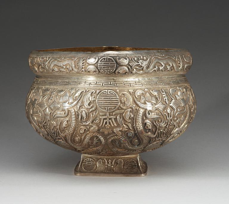 A large silver gilt 'repousse' bowl, late Qing dynasty.