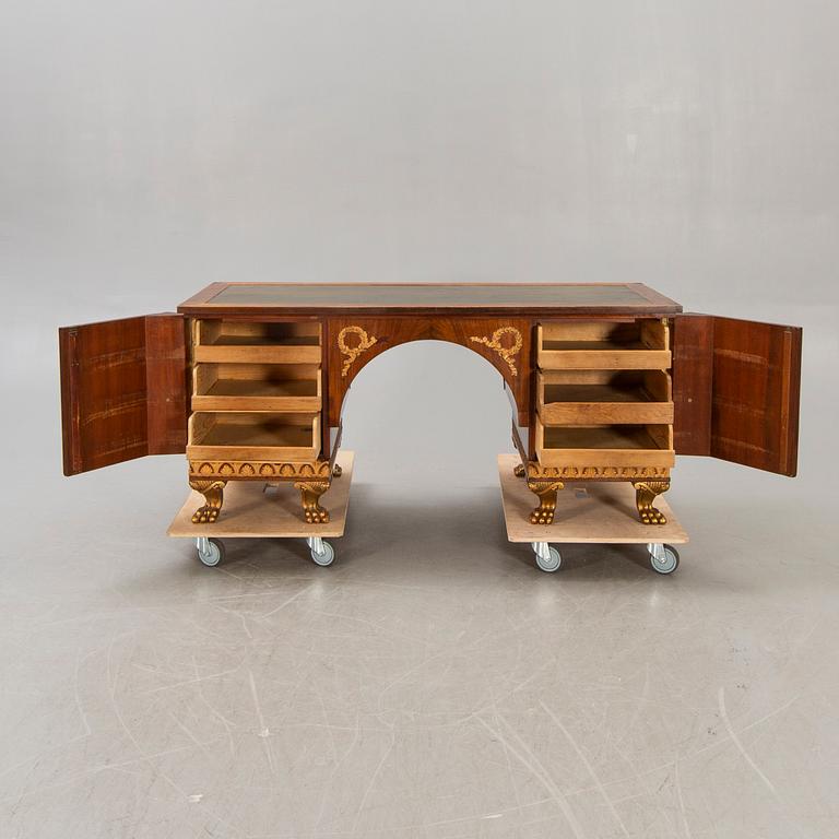 An Empire style mahogany desk 20th century.