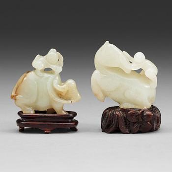 37. Two nephrite figures, late Qing dynasty.