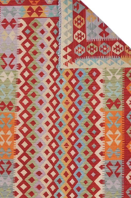 A rug, kilim, ca 244 x 157 cm.