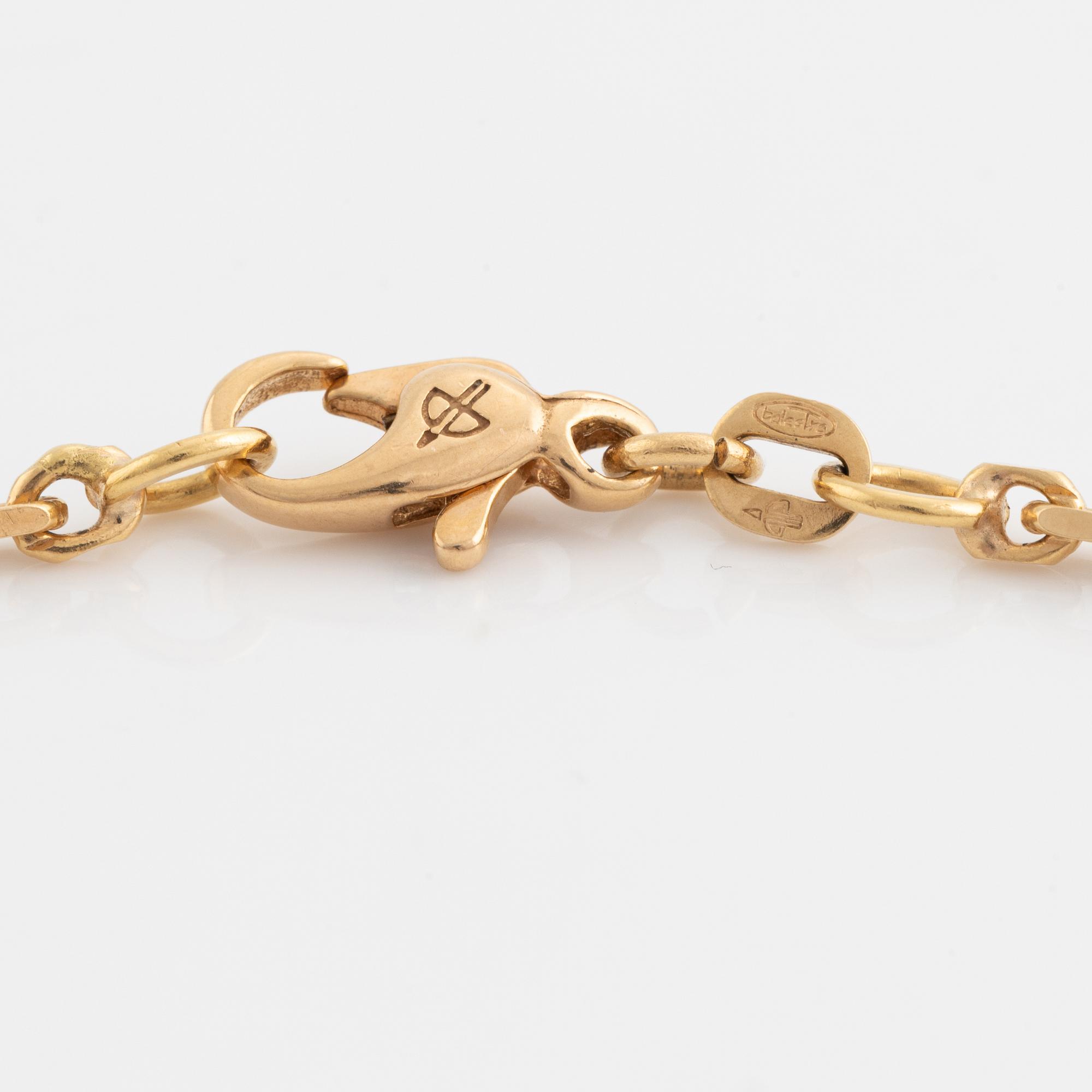 Hängsmycke, i form av leopard, 18K guld med, rubiner, smaragder och briljantslipade diamanter, med kedja.